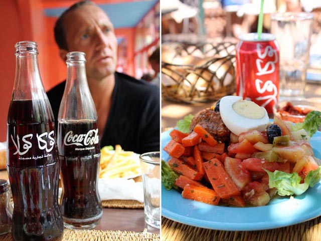 grilled meats and vegetables at a rooftop lunch in Marrakech + Coke bottles with Arabic calligraphy 